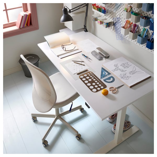 Study desk with chair, stationery, drawings, lamp, bin, shoe rack