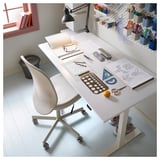 Study desk with chair, stationery, drawings, lamp, bin, shoe rack