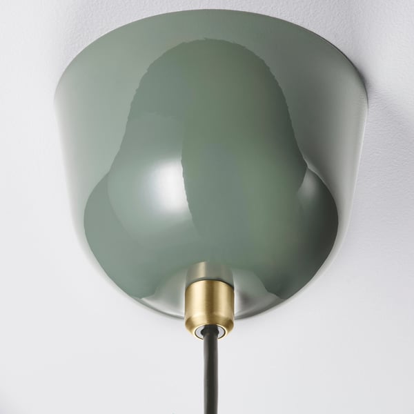 Large modern lamp with green, rounded shade, gold connector, and black cord.