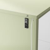 A green metal cabinet with a black lock and attached cable.