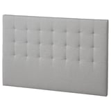 A gray RYKKINN upholstered headboard with modern stitching, designed for comfort and easy wall mounting.