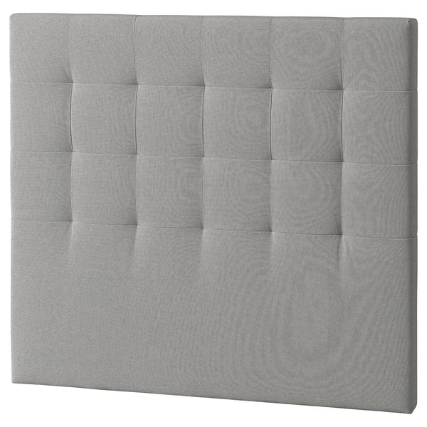 Grey rectangular headboard, soft fabric with tufted squares.
