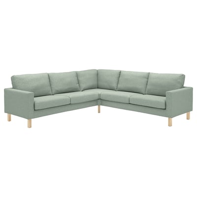 Modern light green corner sofa, 4-seater, wooden legs, straight design.
