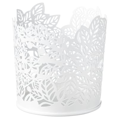 White SAMVERKA tealight holder with leafy design, candle shadows.