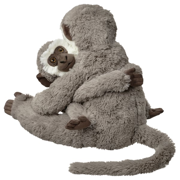 This image shows two gray stuffed animals resembling a monkey and baby monkey, made from recycled materials.