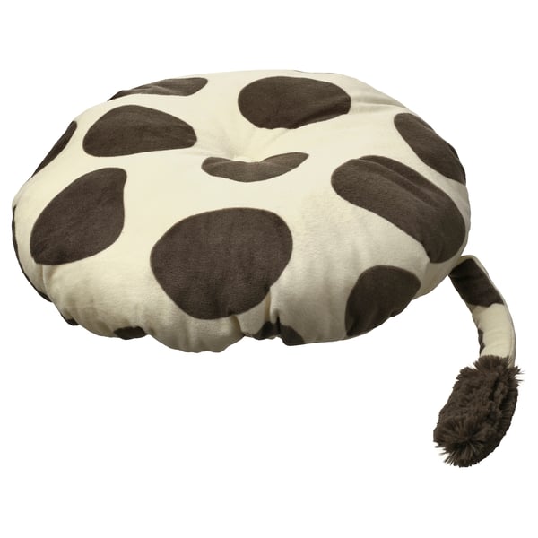 A giraffe-shaped cushion, featuring white with brown spots, made from soft recycled polyester, perfect for a childs stool.