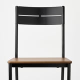 Modern chair with curved steel back, two slats, sturdy wood seat, black metal legs.