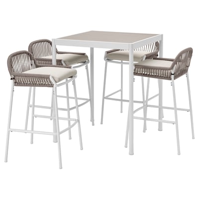 Modern white outdoor bar set with wicker stools.