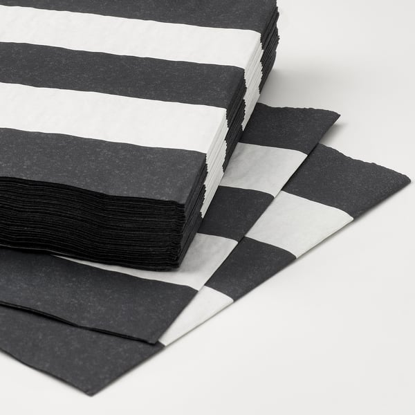 Stack of black and white striped napkins, neatly arranged; prominent texture and absorbent quality.
