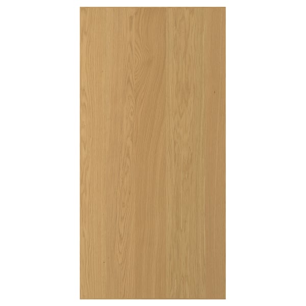 A SINARP wooden door in light brown. Made of oak veneer with a solid oak edge. Rectangular, featuring a simple, elegant design.