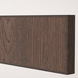 Dark wood-toned cabinet door with oak veneer, featuring solid wood edging and fine grain texture.