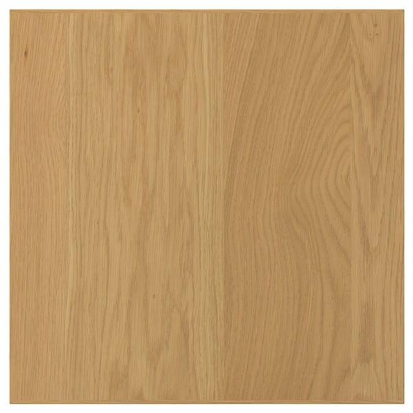 A square SINARP wooden panel in natural oak color. It is made from oak veneer with a solid oak edge. The design is simple and straightforward.