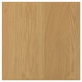 A square SINARP wooden panel in natural oak color. It is made from oak veneer with a solid oak edge. The design is simple and straightforward.