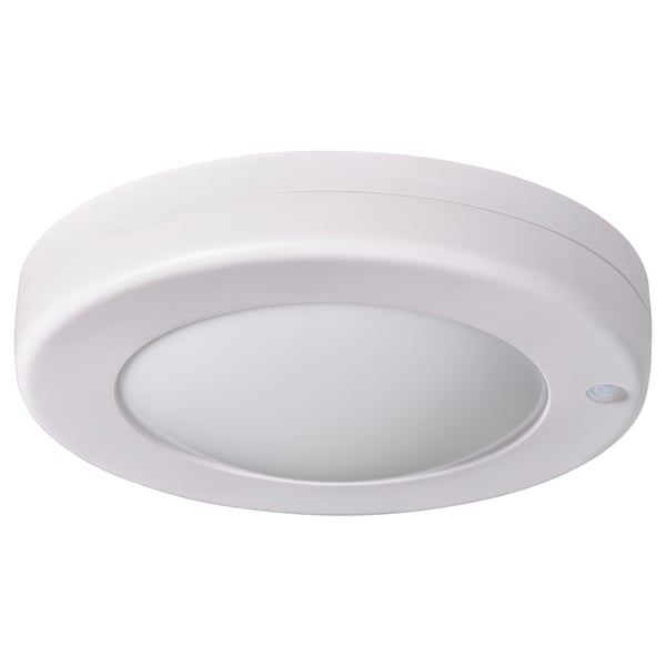 White round SJÖNÖT motion-sensor ceiling light with sleek design.