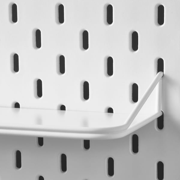 SKÅDIS pegboard shelf close-up, sturdy & organized design.