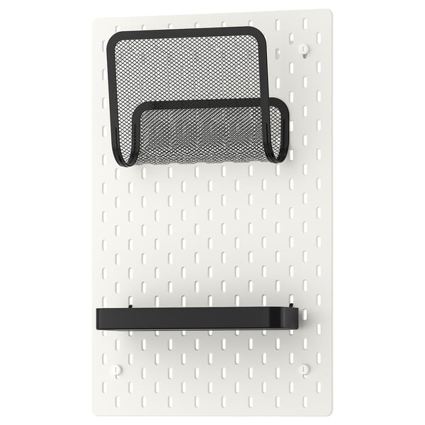 SKÅDIS organizer: white pegboard with black mesh pocket and shelf, rectangular, wall-mounted.