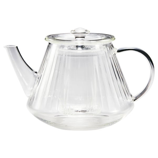 A glass teapot SKÄLRYTA with flute design, infuser, and lid. Heat-resistant with comfortable handle.