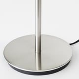 Stylish lamp base with sleek silver finish and circular base, reflecting modern design quality.