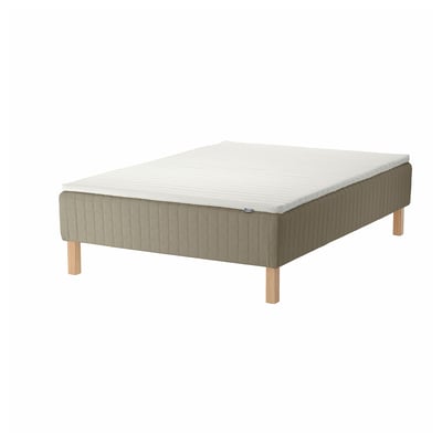 Depicts a SKÅRER bed with a beige wooden base and a white mattress. It has a simple, rectangular design with visible wooden legs.