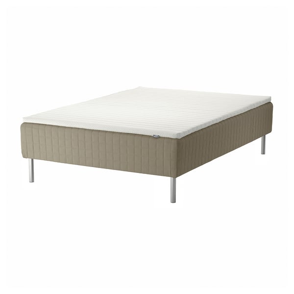 SKÅRER bed: white & beige, rectangular, upholstered base with legs, supportive sprung mattress top.