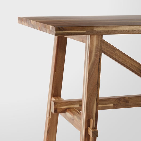 SKOGSTA acacia table with rich brown finish and durable, scratch-resistant surface.