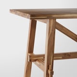 SKOGSTA acacia table with rich brown finish and durable, scratch-resistant surface.