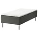 A SKOTTERUD bed in black with white mattress. It has a modern, minimalist design with metal legs.