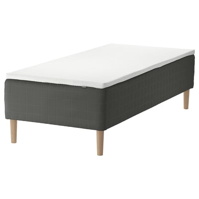 Image depicts a SKOTTERUD grey mattress on wooden legs.
