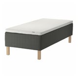 SKOTTERUD bed in dark grey with light grey top, wooden legs. Sleek, modern design for comfort and support.