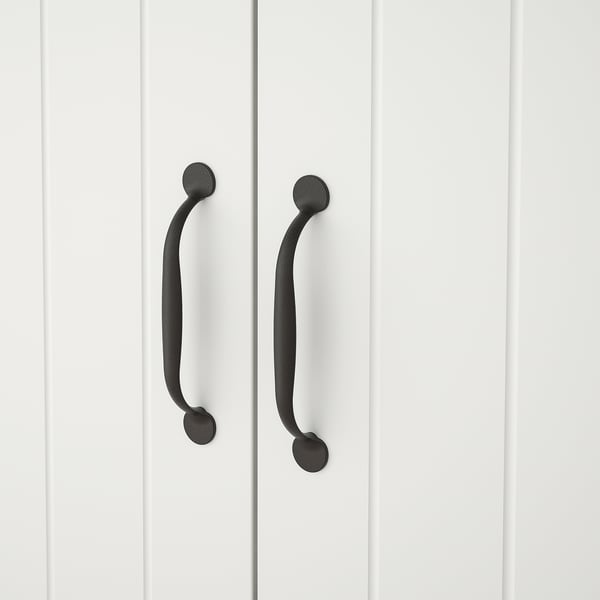 Two horizontal black handles on white wooden doors, evenly spaced, indicating high-quality craftsmanship and design.