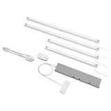 Image displays SKYDRAG led lighting kit, including strips, sensor box, and wireless dimmer, all in white.