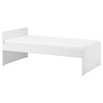 A white SLÄKT bed frame, clean and modern, with rounded corners and a supportive slatted base.