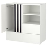 Displays a white ikea SMÅSTAD kids storage unit. It an open door, two shelves, and drawers. The design is compact and functional for children.