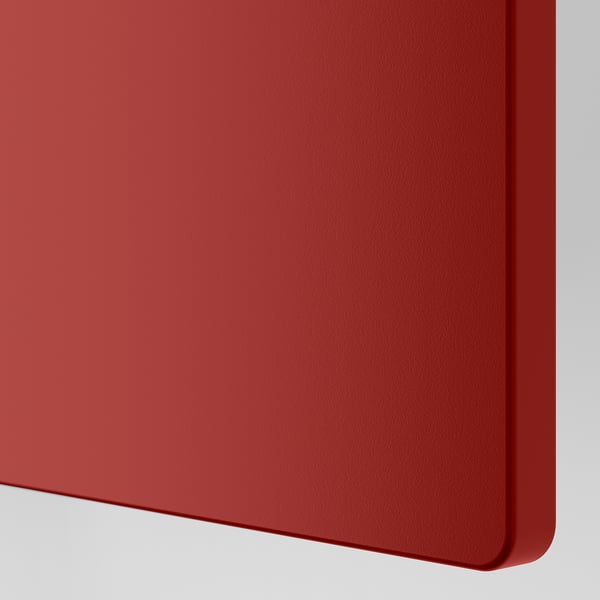 Close-up of smooth, deep red surface; showcasing high-quality finish and sleek, rounded edge.