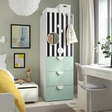 SMÅSTAD striped wardrobe in black and white with blue drawers, tall, near bed and desk, minimalist design with round handles and mirror.