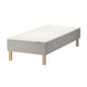 An ikea SNARUM bed with a white and light gray mattress and a gray and light wood base.