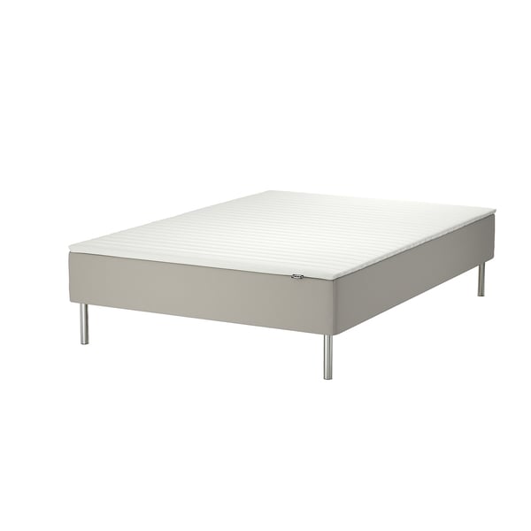 SNARUM bed: white, upholstered, rectangular, raised legs.