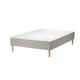 Grey modular bed frame, light wood legs, minimalist design.