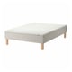 A white SNARUM bed base with light wooden legs, featuring a spring mattress design for comfort.