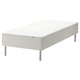 White bed base with metal legs.