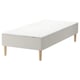 White SNARUM bed base with sprung mattress, wooden legs.