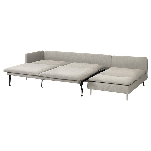 Depicts a grey SÖDERHAMN sofa-bed with a sleek, airy design and high legs. It a modular shape for versatile seating and comfort.
