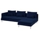Dark blue l-shaped sofa with plush cushions and chrome legs.