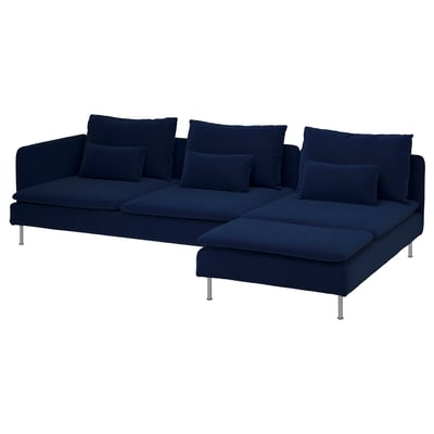 Dark blue l-shaped sofa with plush cushions and chrome legs.