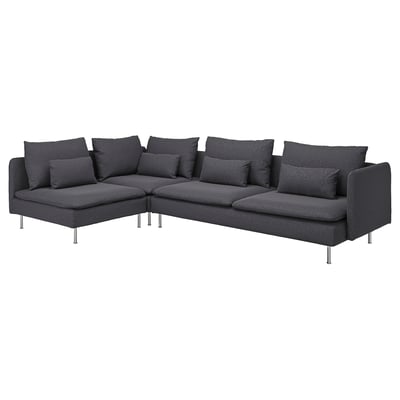 Modern black l-shaped sectional sofa with metal legs, deep cushions, and nine decorative pillows.
