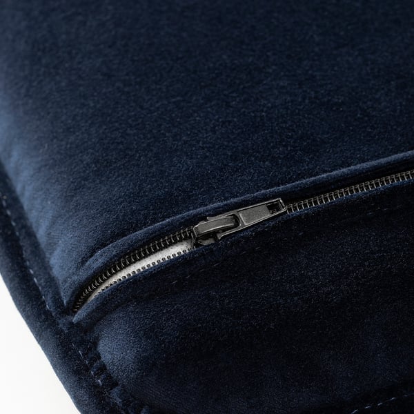 Close-up of navy-blue garment zip, high-quality fabric and sturdy zipper
