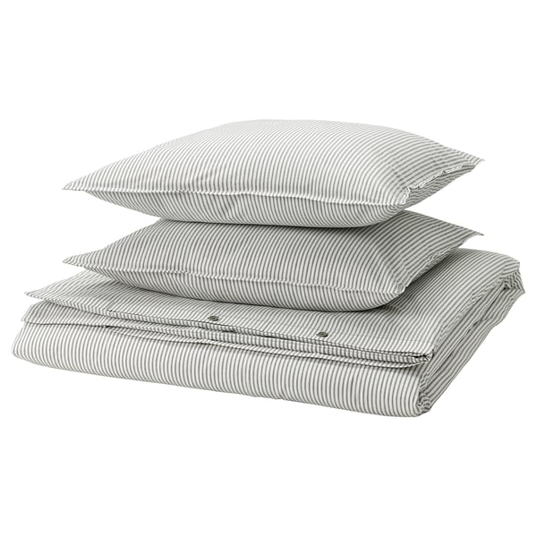 Stack of grey striped pillows & duvet cover, folded in grey and white stripes, SOLFIBBLA set by ikea.