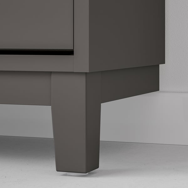 Light gray shoe cabinet with sturdy legs, exuding quality and sleek design.