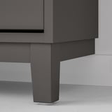 Light gray shoe cabinet with sturdy legs, exuding quality and sleek design.