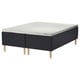Black IKEA STAVANGER bed base with light wood legs, sturdy frame, quilted pattern.